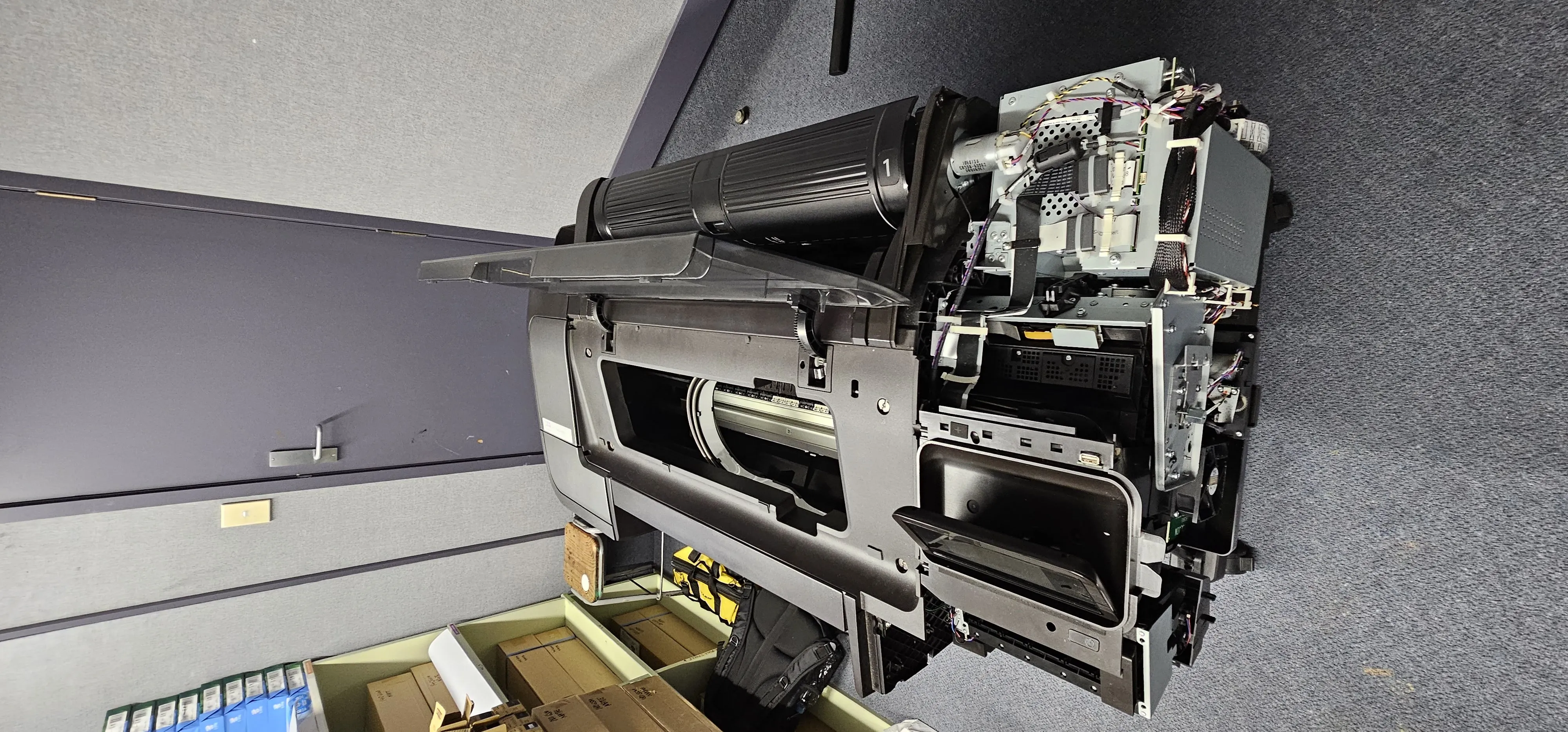 Commercial printer opened up for servicing